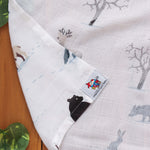 Nature-themed baby towel in soft muslin. Lightweight and gentle for newborn care.