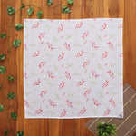 Soft muslin baby towel with red & green leaf print. 70x70 cm. Gentle on skin, perfect for newborn care.