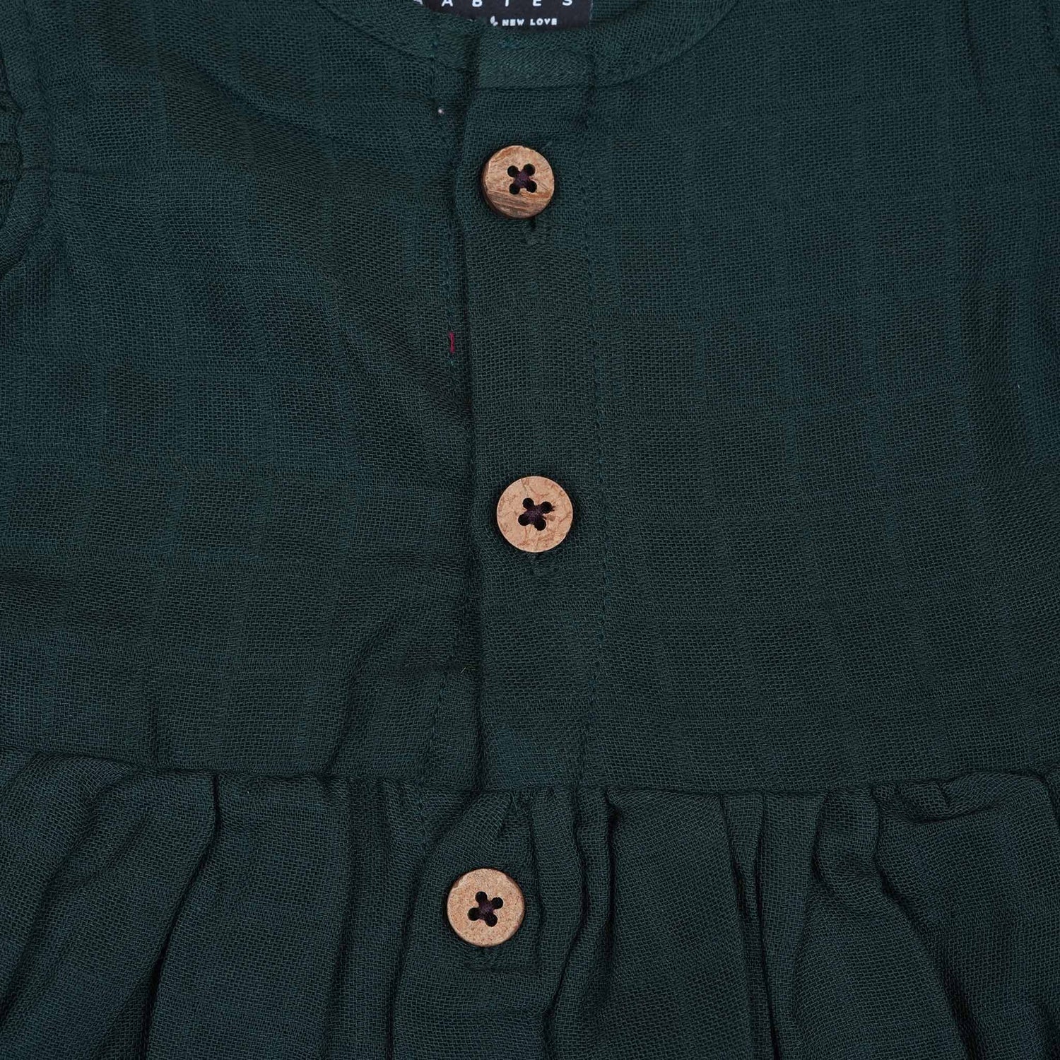 Dark Green Muslin Baby Frock with Wooden Buttons – Soft & Stylish Boon Babies