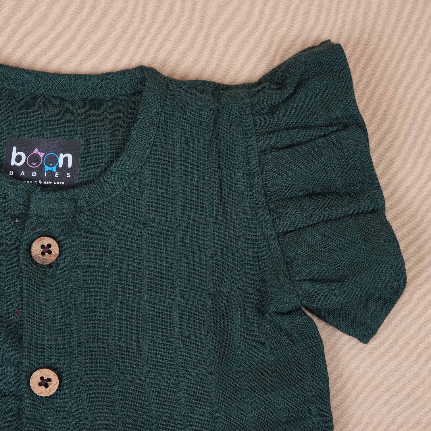 Dark Green Muslin Baby Frock with Wooden Buttons – Soft & Stylish Boon Babies