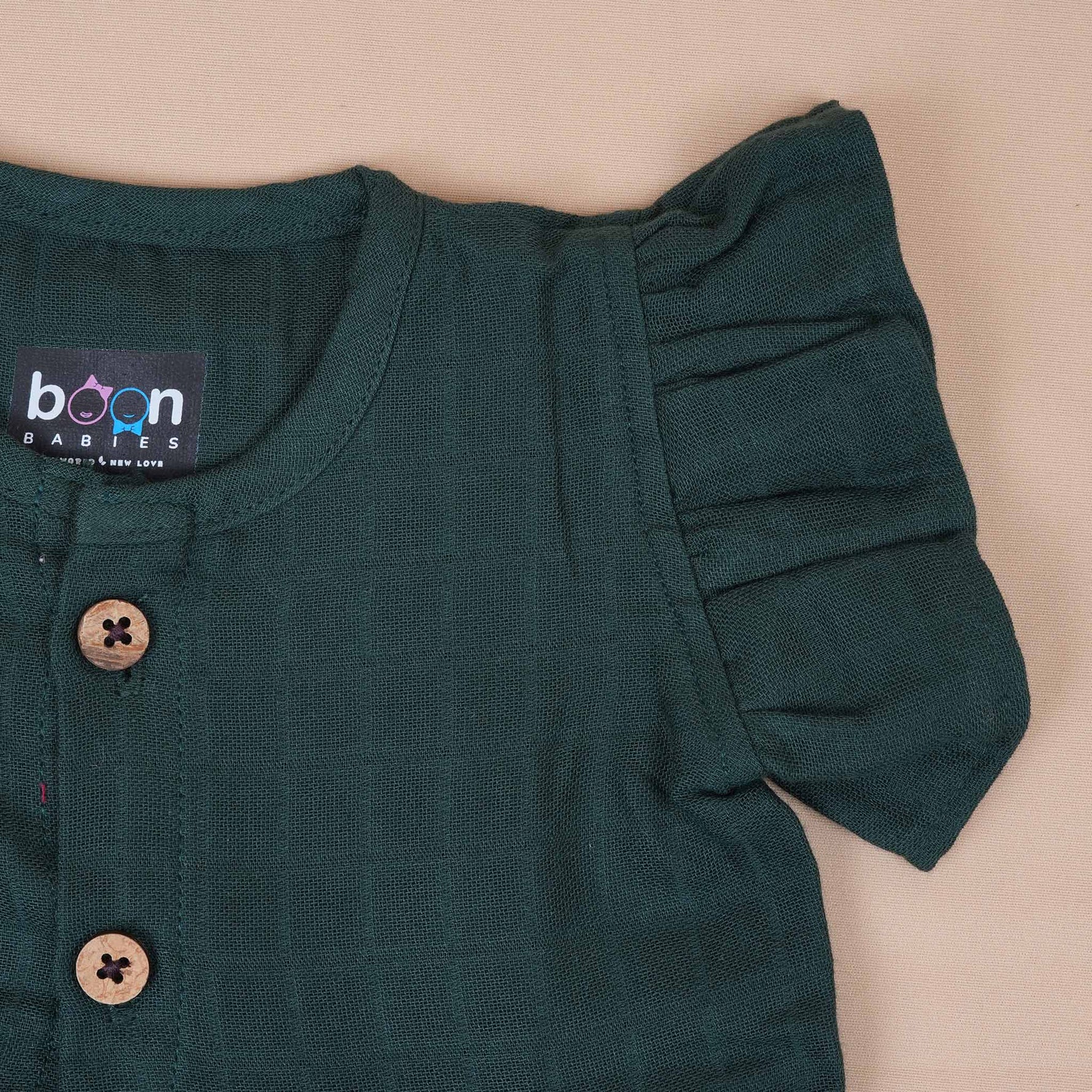 Dark Green Muslin Baby Frock with Wooden Buttons – Soft & Stylish Boon Babies