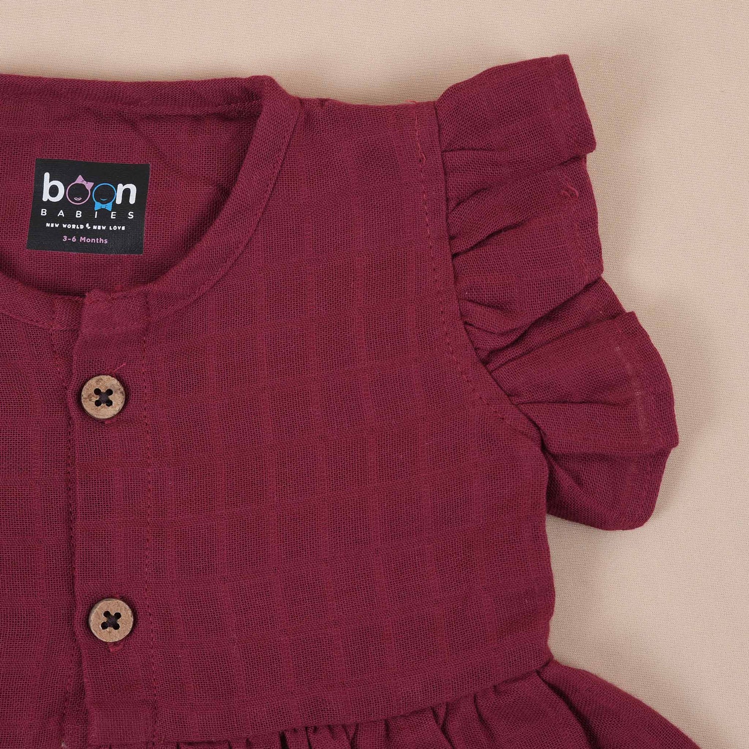 Maroon Muslin Baby Frock – Soft & Stylish with Wooden Buttons Boon Babies