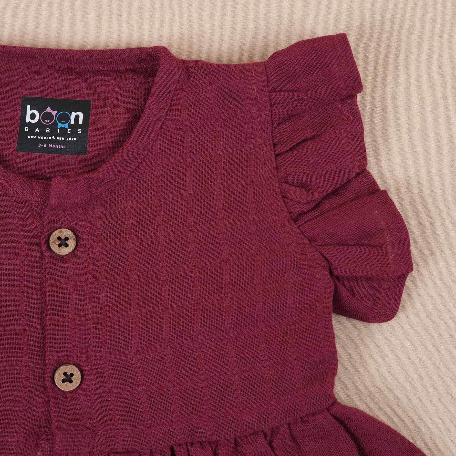 Maroon Muslin Baby Frock – Soft & Stylish with Wooden Buttons Boon Babies