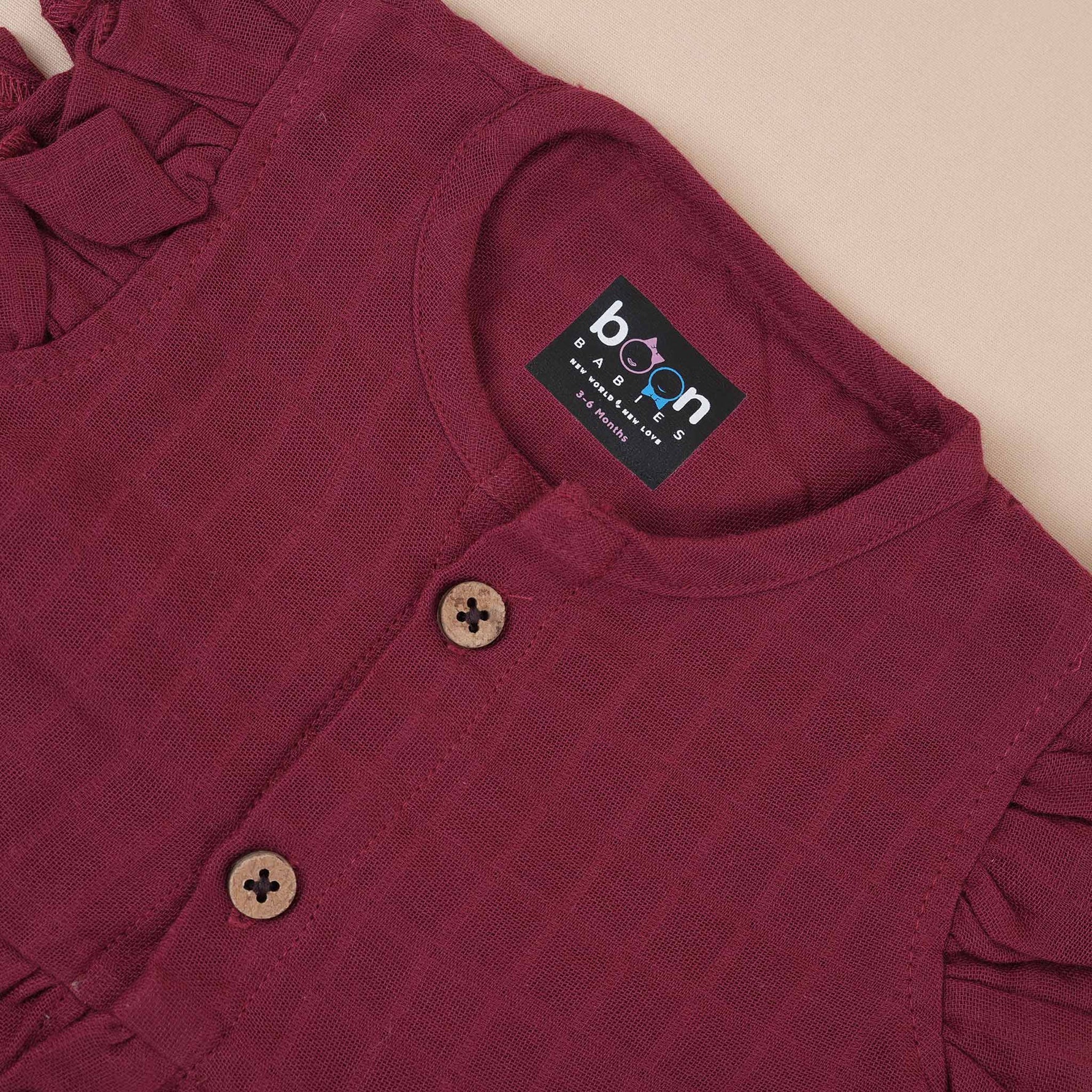 Maroon Muslin Baby Frock – Soft & Stylish with Wooden Buttons Boon Babies
