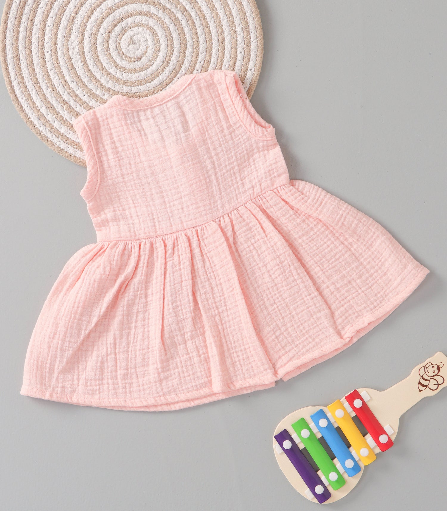 Peach Blush Crinkled Muslin Sleeveless Frock