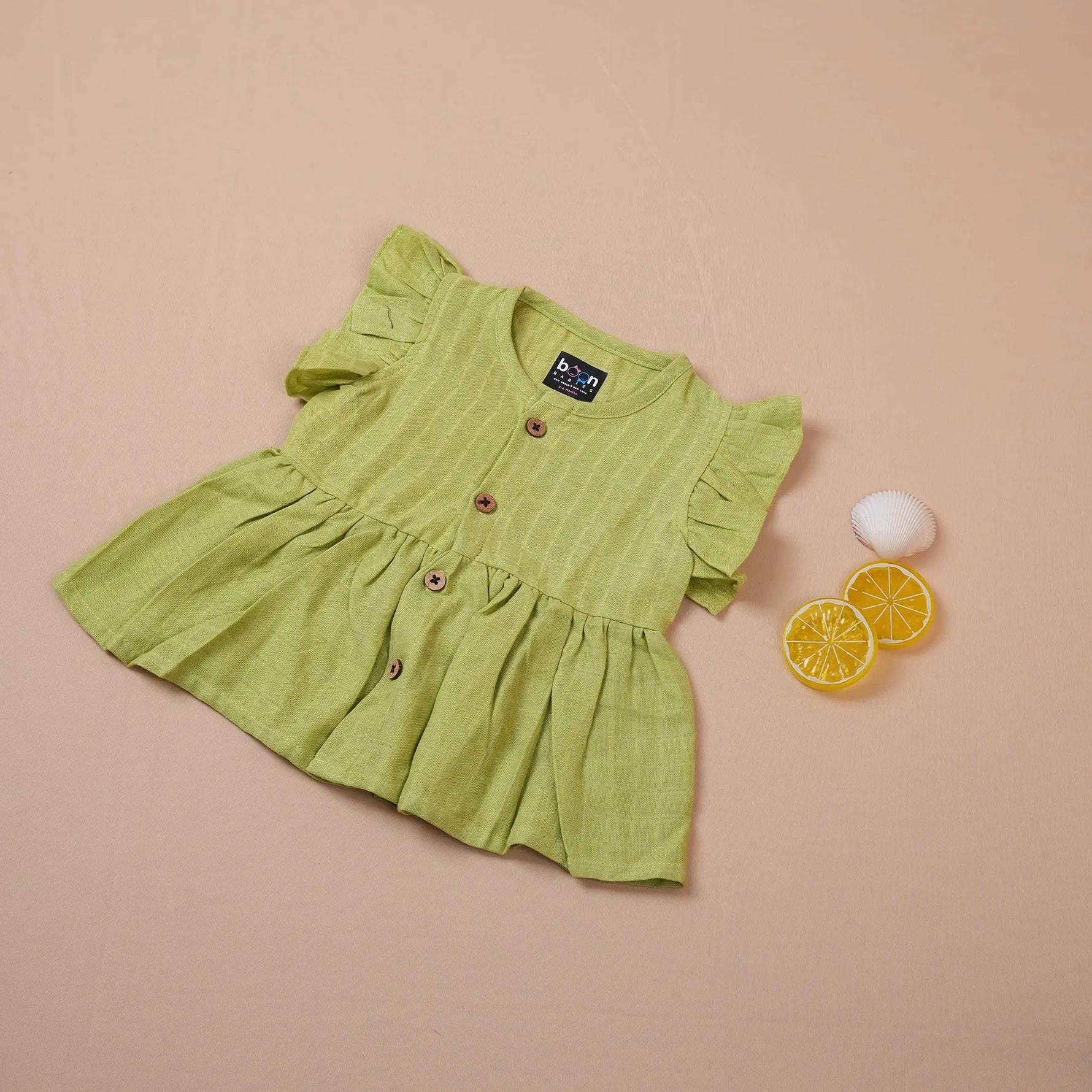 Pista Green Muslin Baby Frock with Wooden Buttons – Soft & Stylish Boon Babies