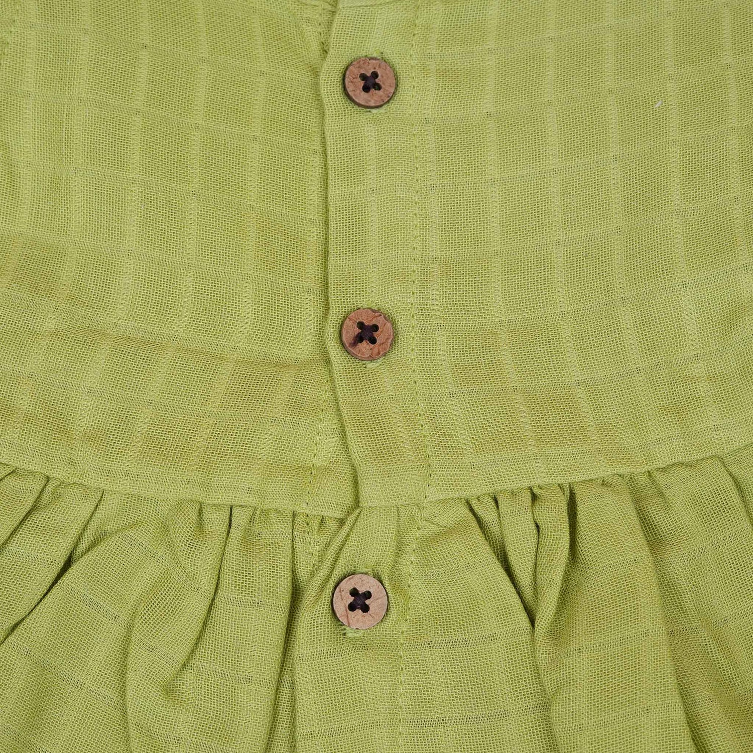 Pista Green Muslin Baby Frock with Wooden Buttons – Soft & Stylish Boon Babies