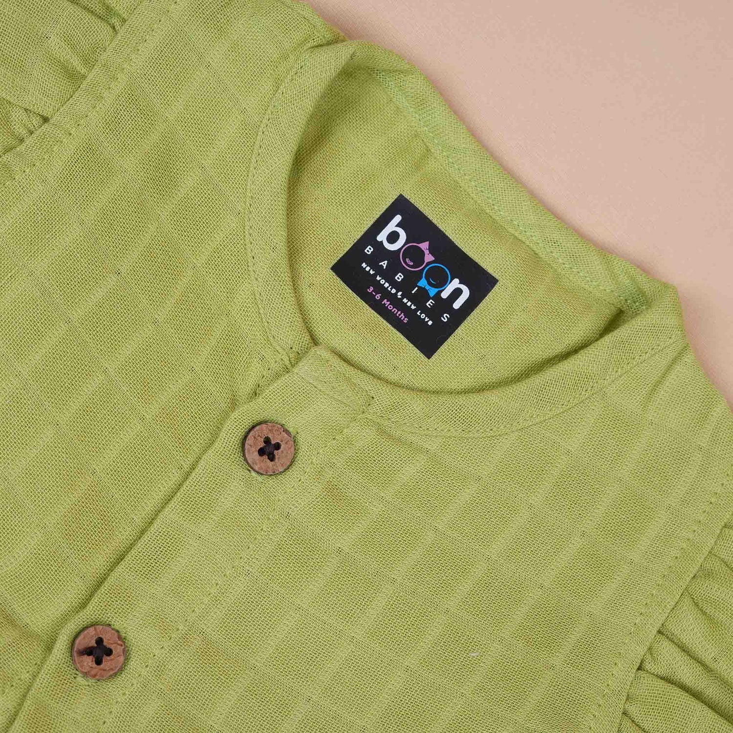 Pista Green Muslin Baby Frock with Wooden Buttons – Soft & Stylish Boon Babies