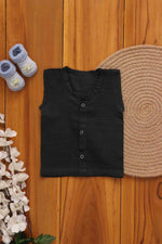 Organic green muslin baby jabla by Boon Babies, two-layer solid cotton garment for infants, comfortable and breathable.