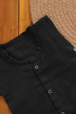 Organic green muslin baby jabla by Boon Babies, two-layer solid cotton garment for comfort and softness in 0-3 months.