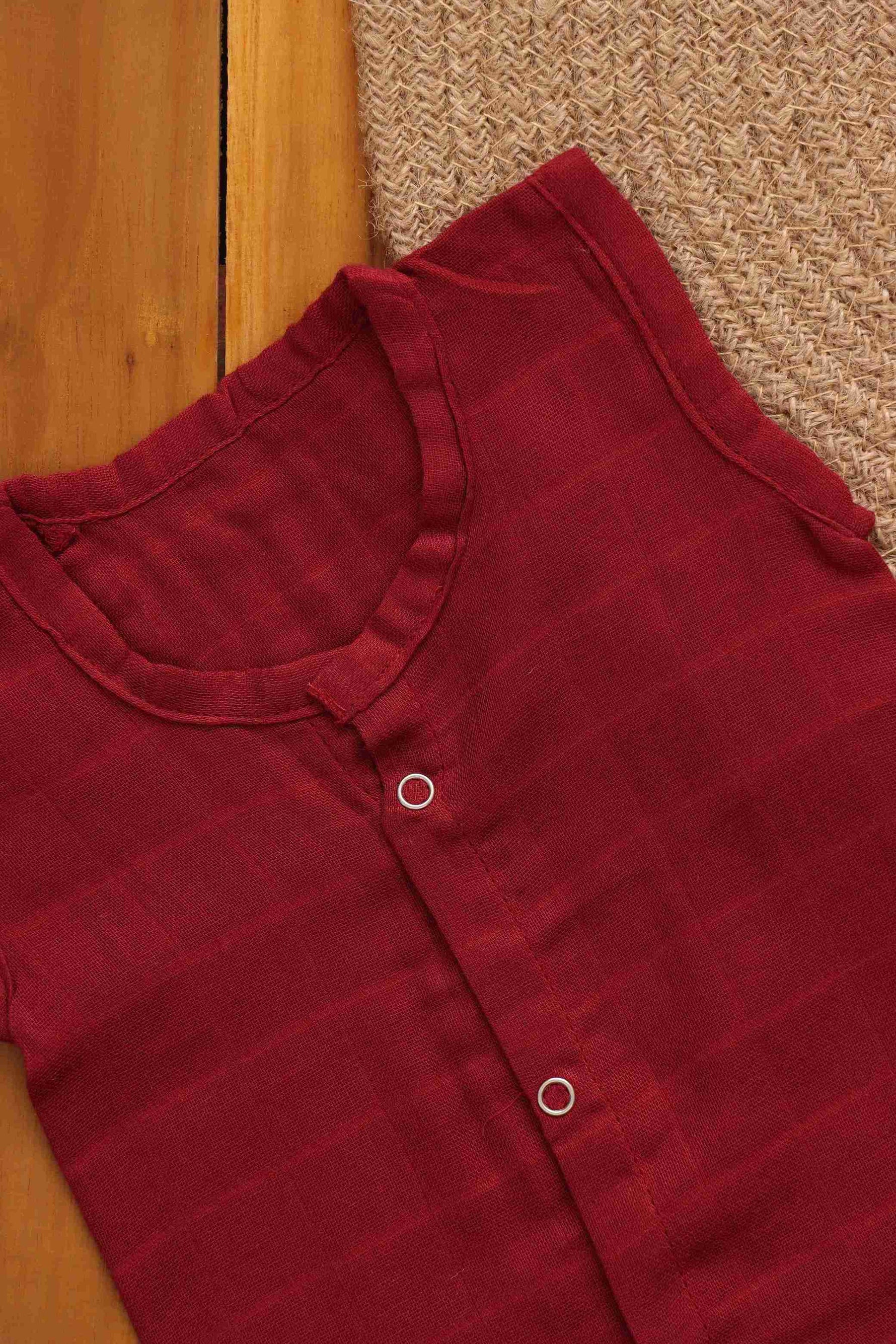 Elegant maroon two-layer muslin baby jabla by Boon Babies, featuring a comfortable solid design for 0-3 months.