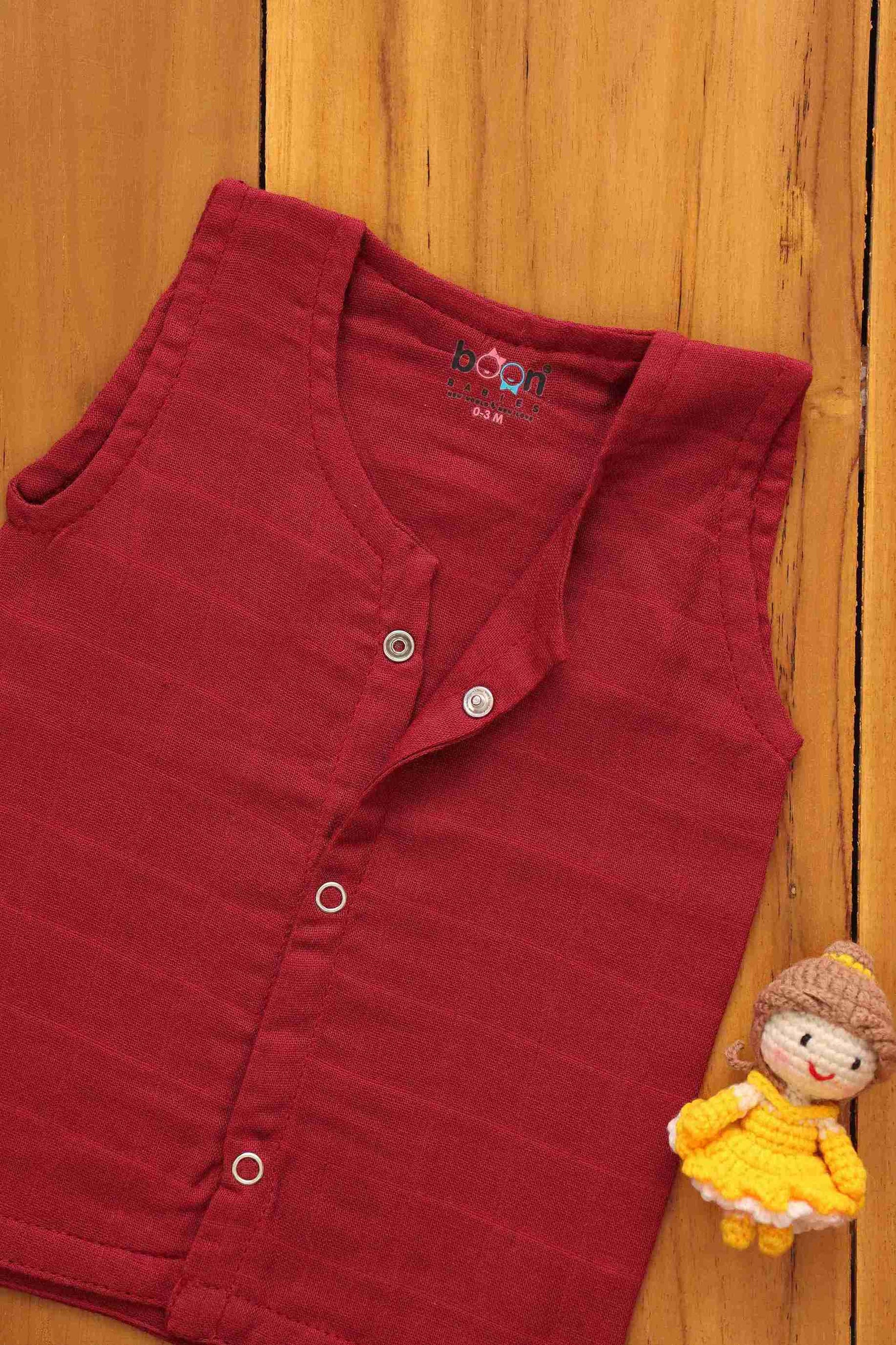 Maroon solid organic muslin jabla for babies with snap closure, four-layer breathable fabric by Boon Babies.