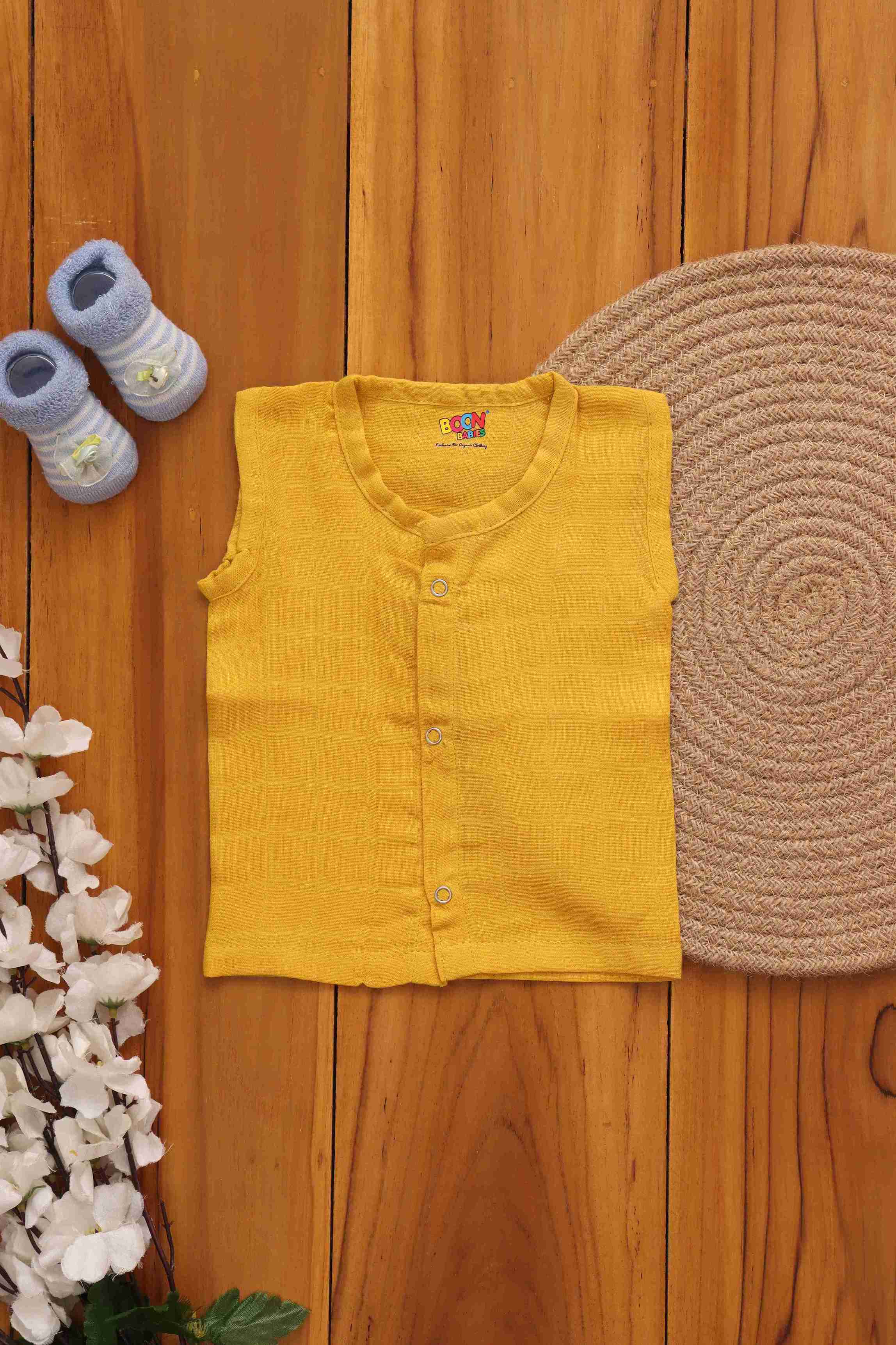 Soft muslin babywear in mustard yellow, Boon Babies solid jabla for 0-3 months, made from eco-friendly, breathable double-layer muslin.