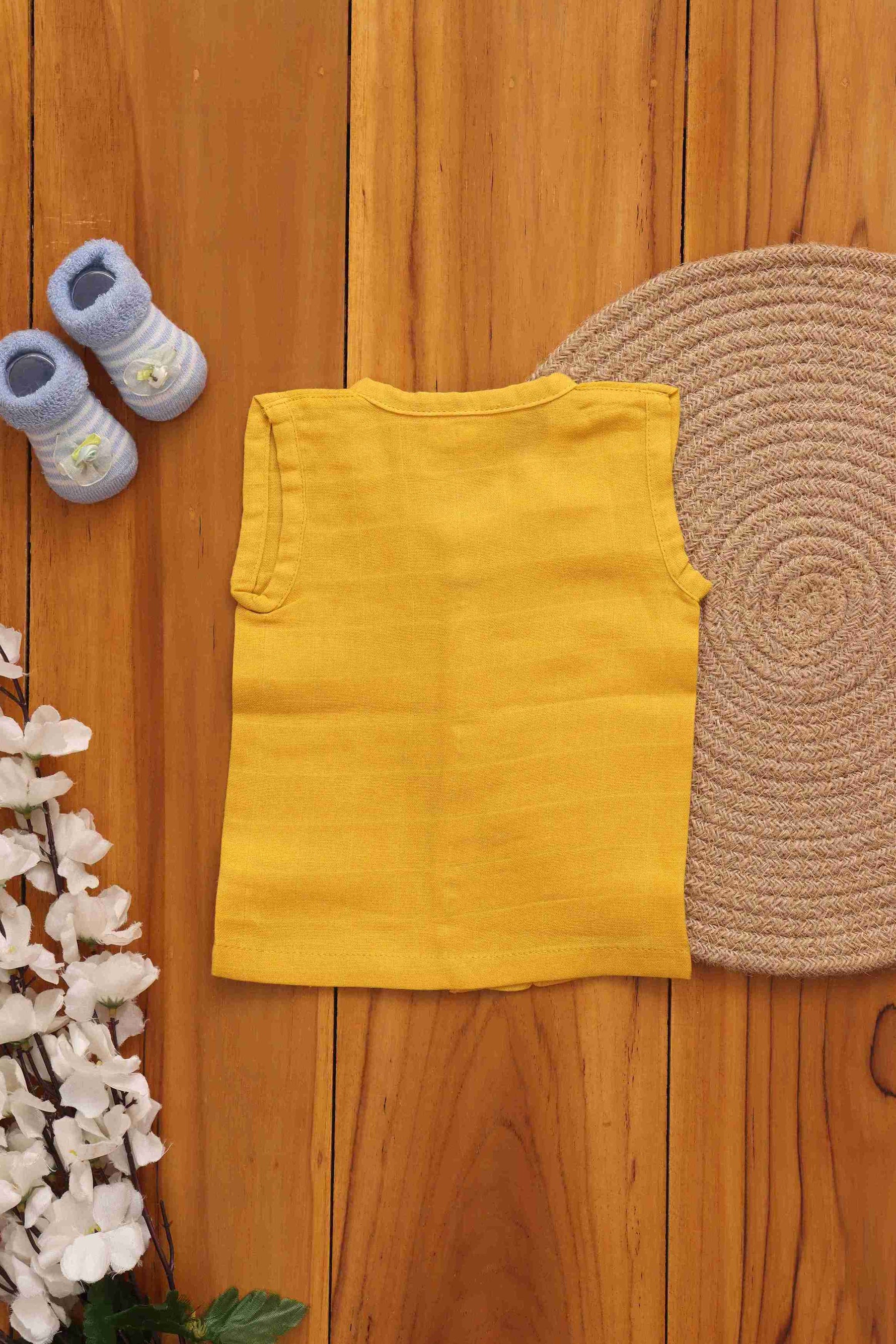Soft muslin babywear in mustard yellow, Boon Babies solid jabla for 0-3 months, eco-friendly 2-layer breathable fabric.