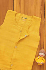 Organic muslin baby vest in mustard yellow, soft and eco-friendly solid jabla for 0-3 months by Boon Babies.