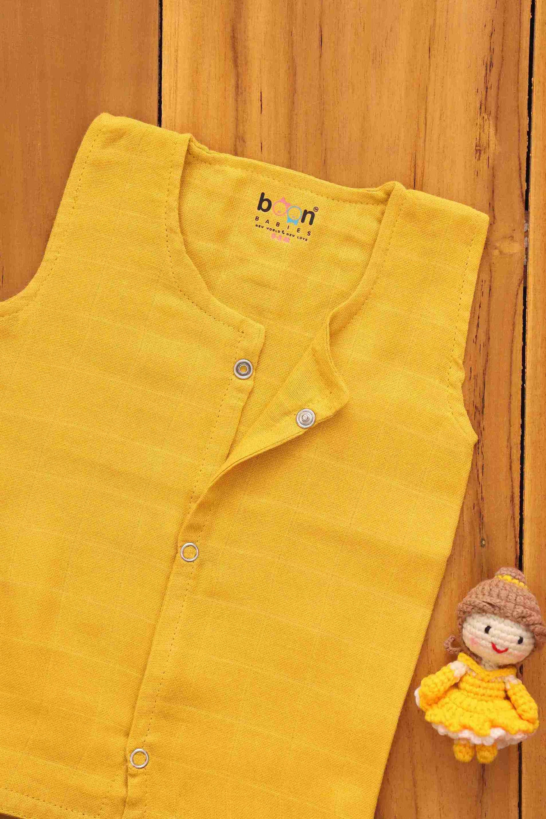 Organic muslin baby vest in mustard yellow, soft and eco-friendly solid jabla for 0-3 months by Boon Babies.