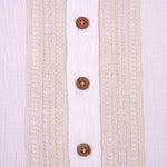 Boys white cotton popcorn shirt with wooden buttons, solid style, by Boon Babies, suitable for 6-12 months.