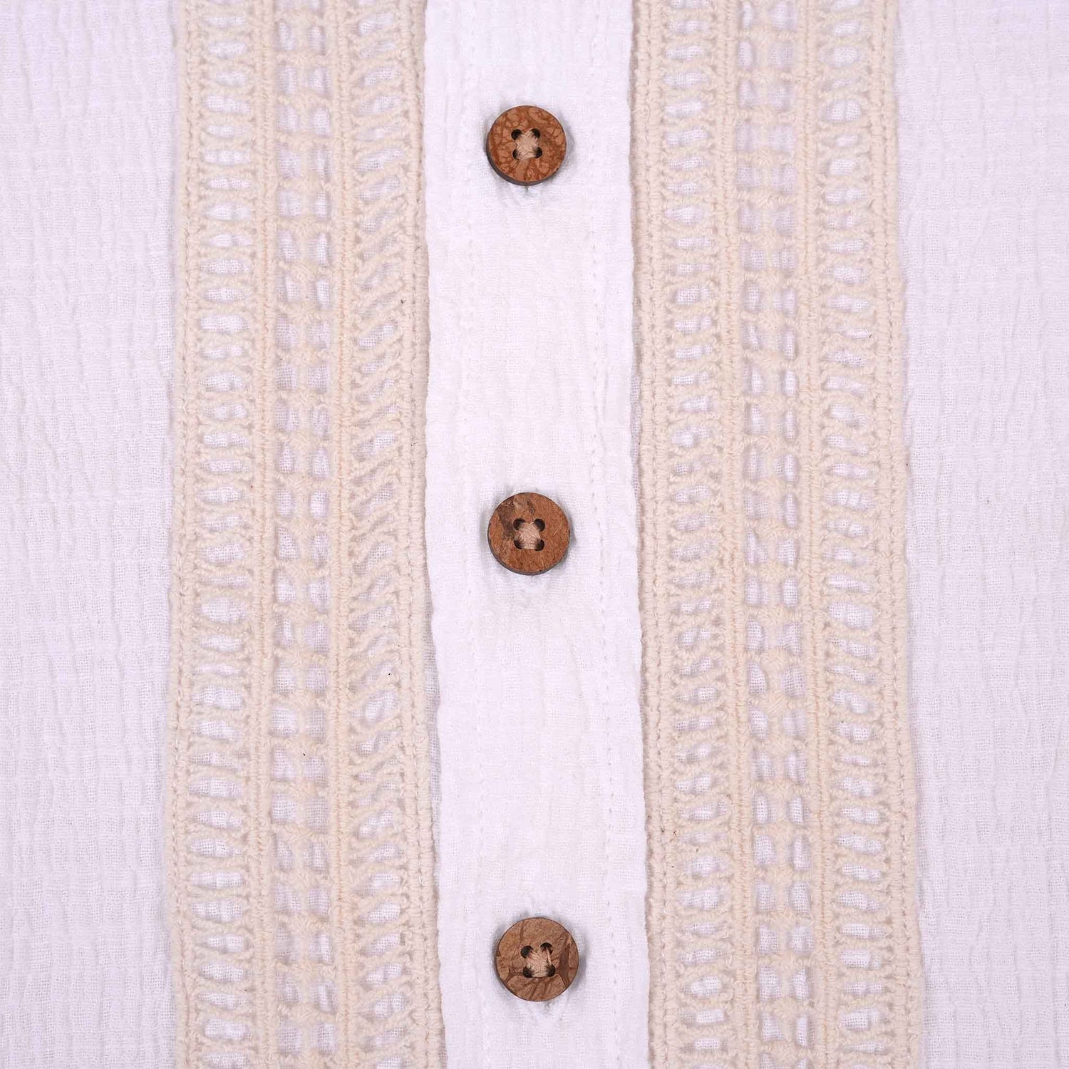 Boys white cotton popcorn shirt with wooden buttons, solid style, by Boon Babies, suitable for 6-12 months.