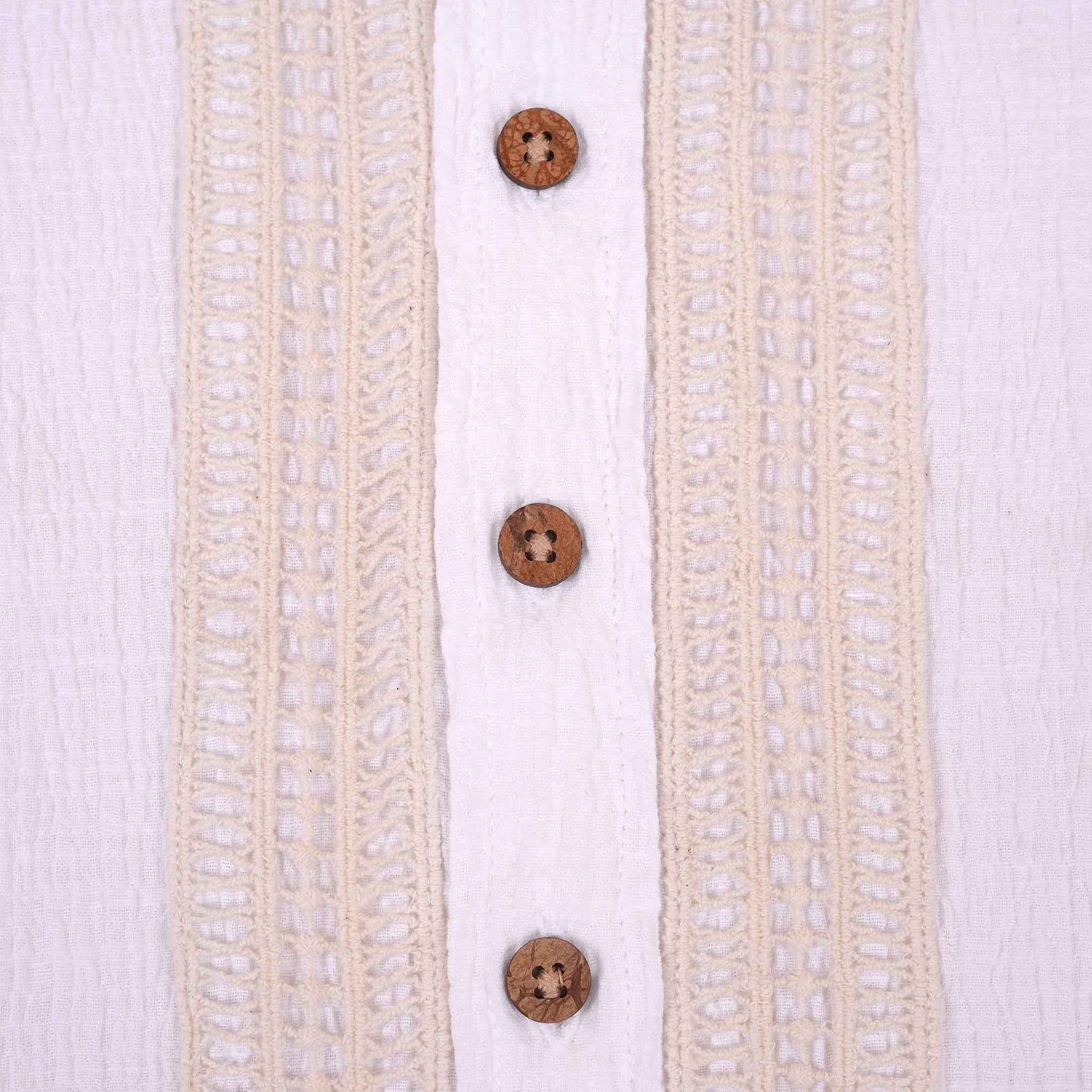 Boys white cotton popcorn shirt with wooden buttons, solid style, by Boon Babies, suitable for 6-12 months.