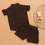 Dark brown boys’ crinkled muslin shirt and shorts set with monkey patch and Chinese collar – breathable summer co-ord by Boon Babies.
