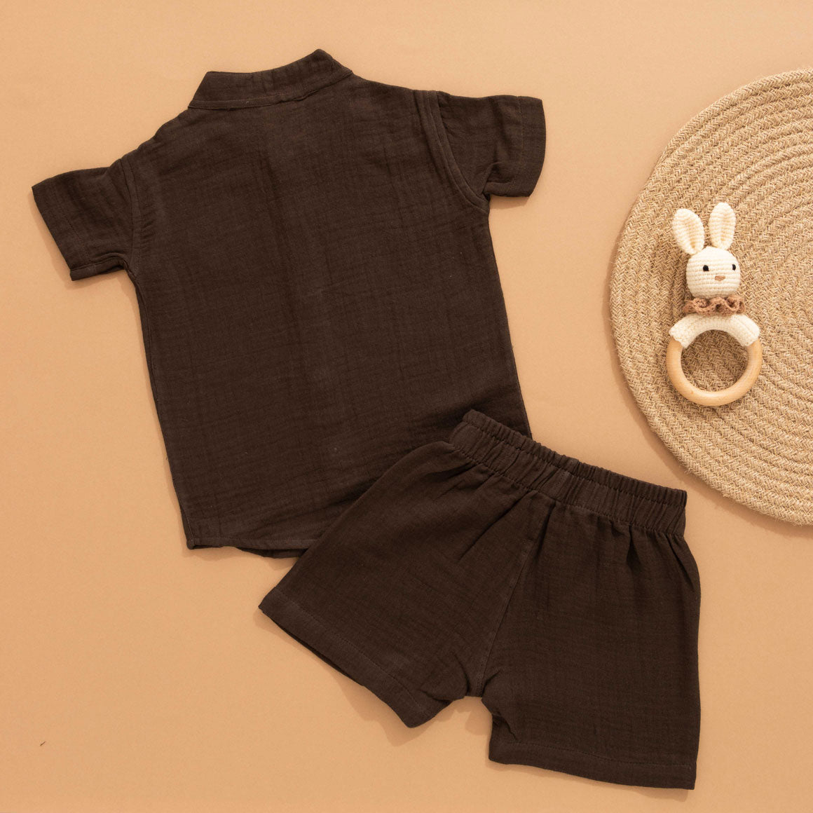 Dark brown boys’ crinkled muslin shirt and shorts set with monkey patch and Chinese collar – breathable summer co-ord by Boon Babies.
