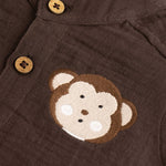 Dark brown boys’ crinkled muslin shirt and shorts set with monkey patch and Chinese collar – breathable summer co-ord by Boon Babies.
