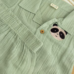 Mint green boys’ shirt and shorts co-ord set in crinkled muslin with panda embroidery and wooden buttons – from Boon Babies kidswear in Coimbatore.
