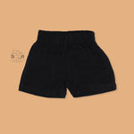 Black crinkle muslin shirt and shorts set for boys featuring lion face embroidery and wooden buttons – breathable toddler outfit by Boon Babies, Coimbatore.
