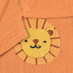 Orange crinkle muslin shirt and shorts set for boys with lion face embroidery, open collar, and elastic shorts – Boon Babies’ breathable summer wear from Coimbatore.
