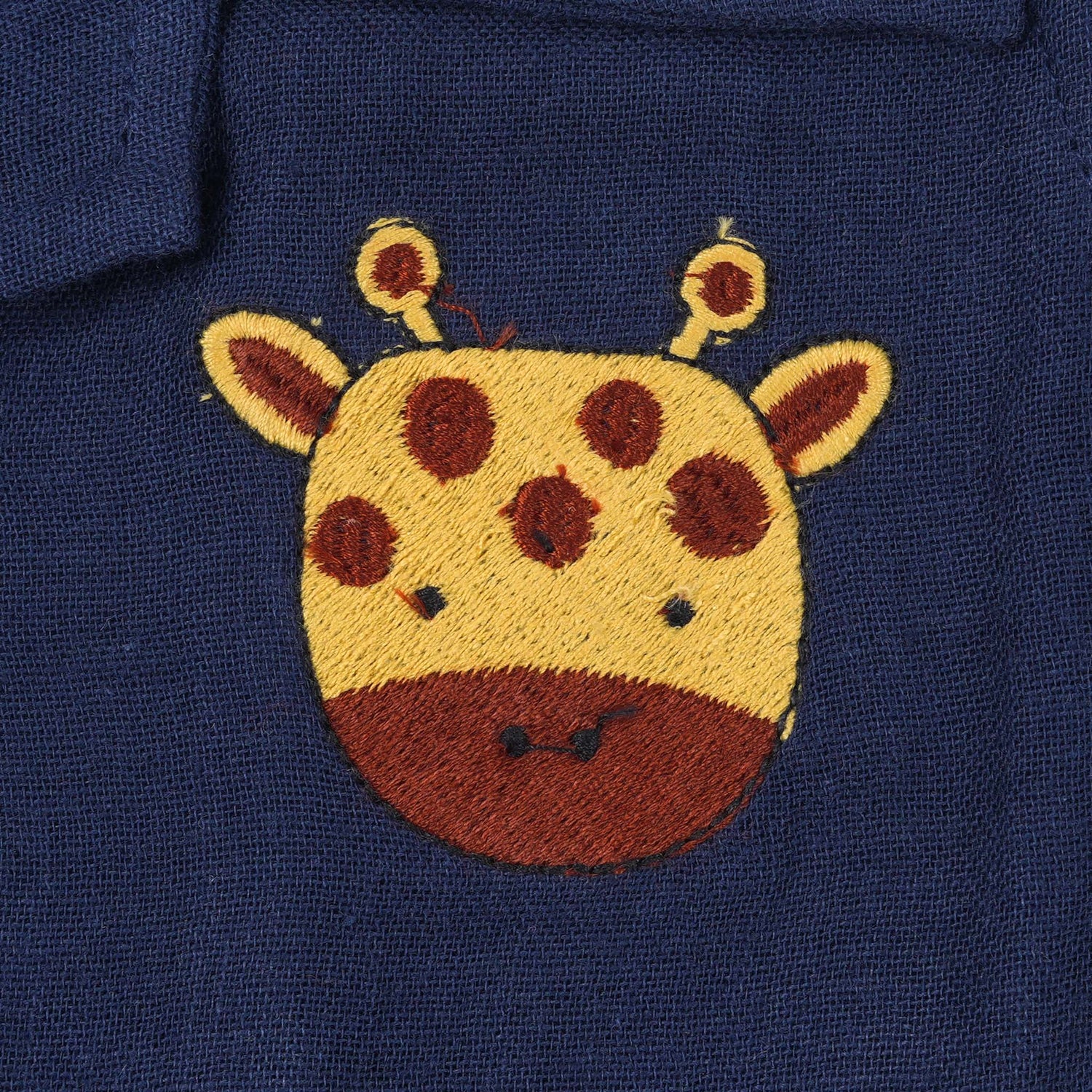Navy blue crinkle muslin shirt and shorts set for boys with giraffe face embroidery, wooden buttons, and soft shorts – Boon Babies summer outfit from Coimbatore.
