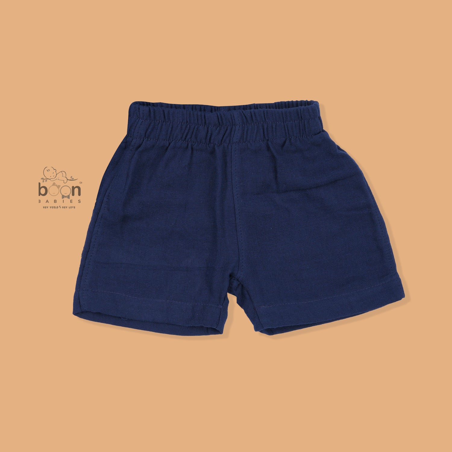 Navy blue crinkle muslin shirt and shorts set for boys with giraffe face embroidery, wooden buttons, and soft shorts – Boon Babies summer outfit from Coimbatore.
