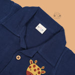Navy blue crinkle muslin shirt and shorts set for boys with giraffe face embroidery, wooden buttons, and soft shorts – Boon Babies summer outfit from Coimbatore.
