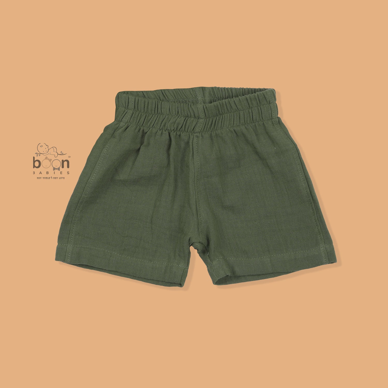 Olive green crinkle muslin shirt and shorts set with giraffe embroidery for boys aged 12M–5Y – a soft, breathable outfit by Boon Babies in Coimbatore.
