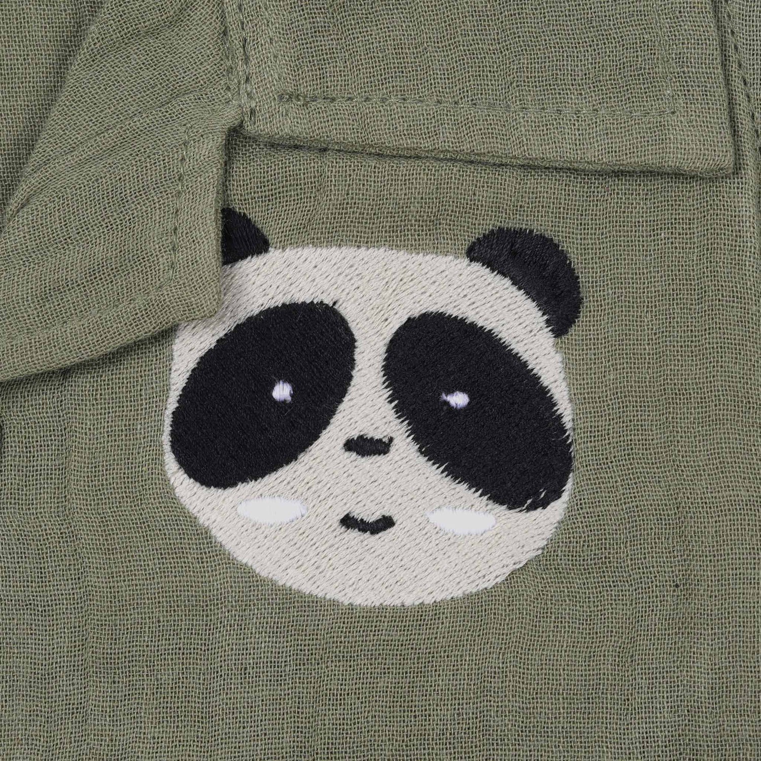 Panda face embroidered crinkle muslin shirt and shorts set in earthy green for boys, featuring an open collar and elastic shorts – from Boon Babies, Coimbatore.
