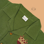 Parrot green crinkle muslin shirt and shorts set with giraffe embroidery for boys – made by Boon Babies, Coimbatore, in breathable fabric for ages 12M to 5Y.
