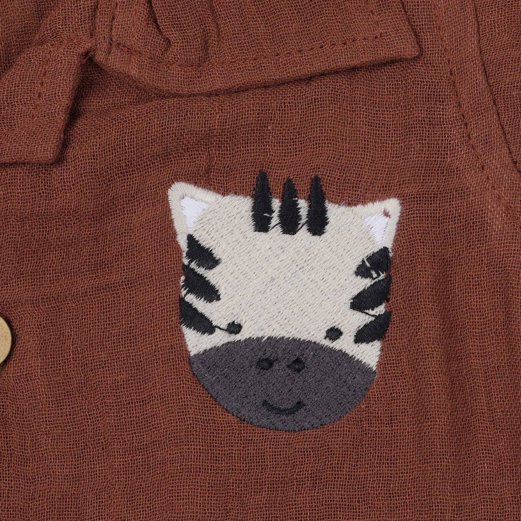 Rust brown crinkle muslin shirt and shorts set with zebra embroidery for boys – soft, breathable kidswear by Boon Babies, Coimbatore.
