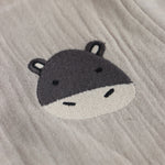 Beige baby boys’ muslin shirt and shorts set with hippo embroidery, made of soft crinkled muslin – Boon Babies eco-friendly summer wear from Coimbatore.
