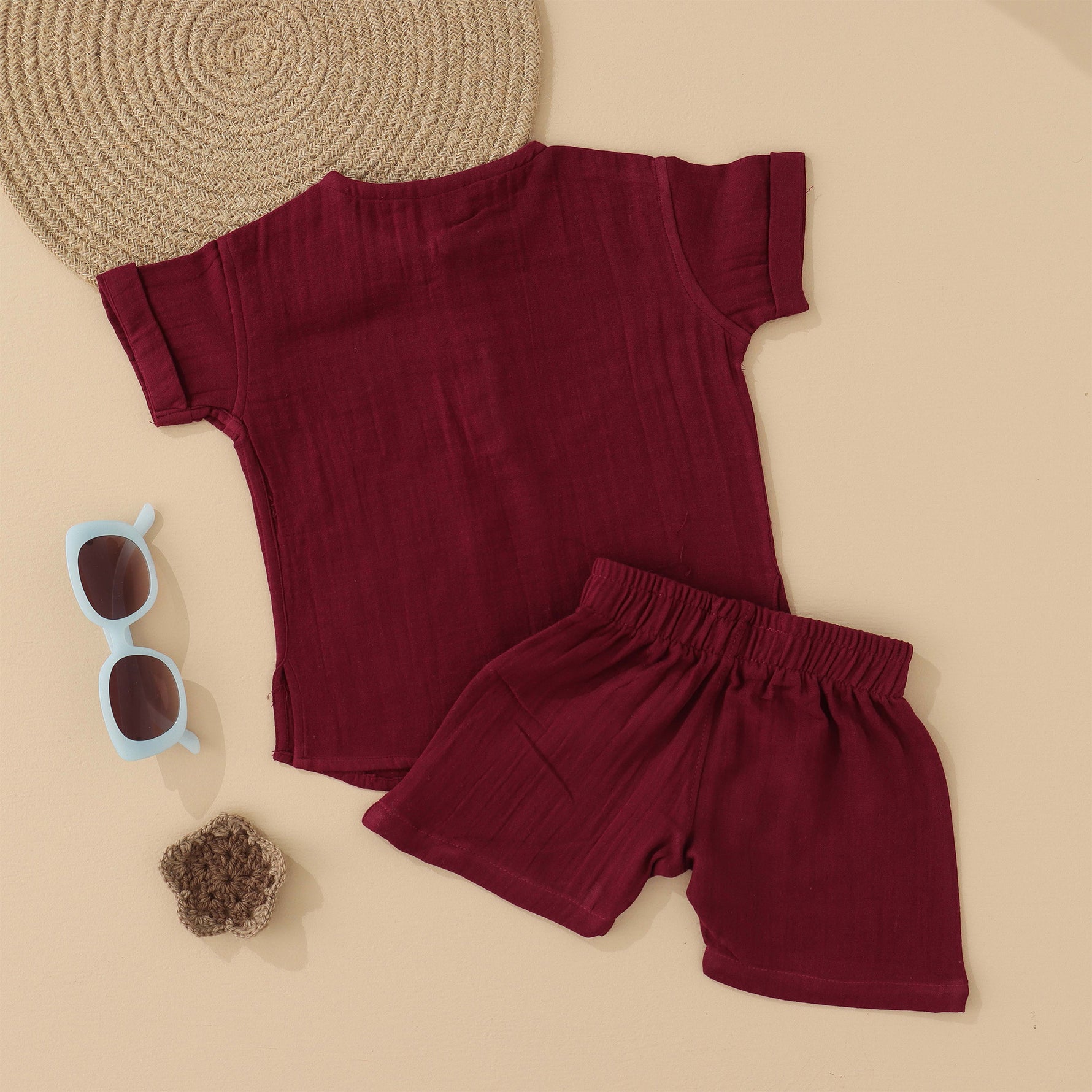Maroon boys crinkled muslin shirt and shorts set with panda patch, round neck, and wooden buttons – breathable summer wear from Boon Babies, Coimbatore.

