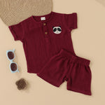 Maroon boys crinkled muslin shirt and shorts set with panda patch, round neck, and wooden buttons – breathable summer wear from Boon Babies, Coimbatore.
