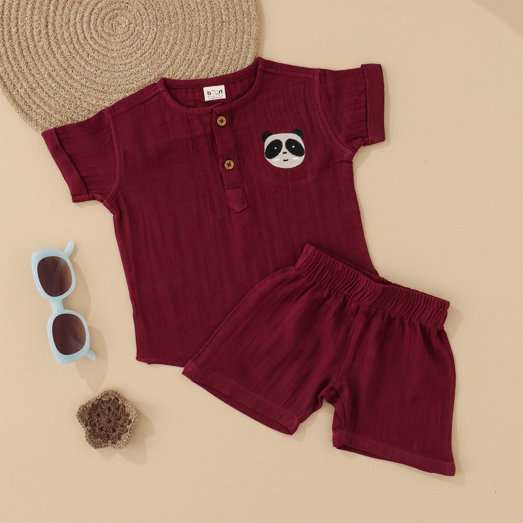 Maroon boys crinkled muslin shirt and shorts set with panda patch, round neck, and wooden buttons – breathable summer wear from Boon Babies, Coimbatore.

