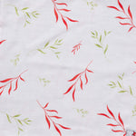 Gentle and absorbent white muslin baby wipe cloth with leaf print. 32x32 cm. Ideal for feeding, burping & face wiping.