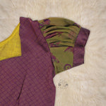 Traditional silk ethnic frock in olive green and maroon with festive motifs, perfect for girls aged 1 to 5 years. Elegant and comfortable for celebrations.