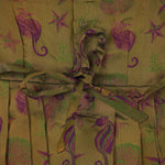 Traditional silk ethnic frock in olive green and maroon with festive motifs, perfect for girls aged 1 to 5 years. Elegant and comfortable for celebrations.