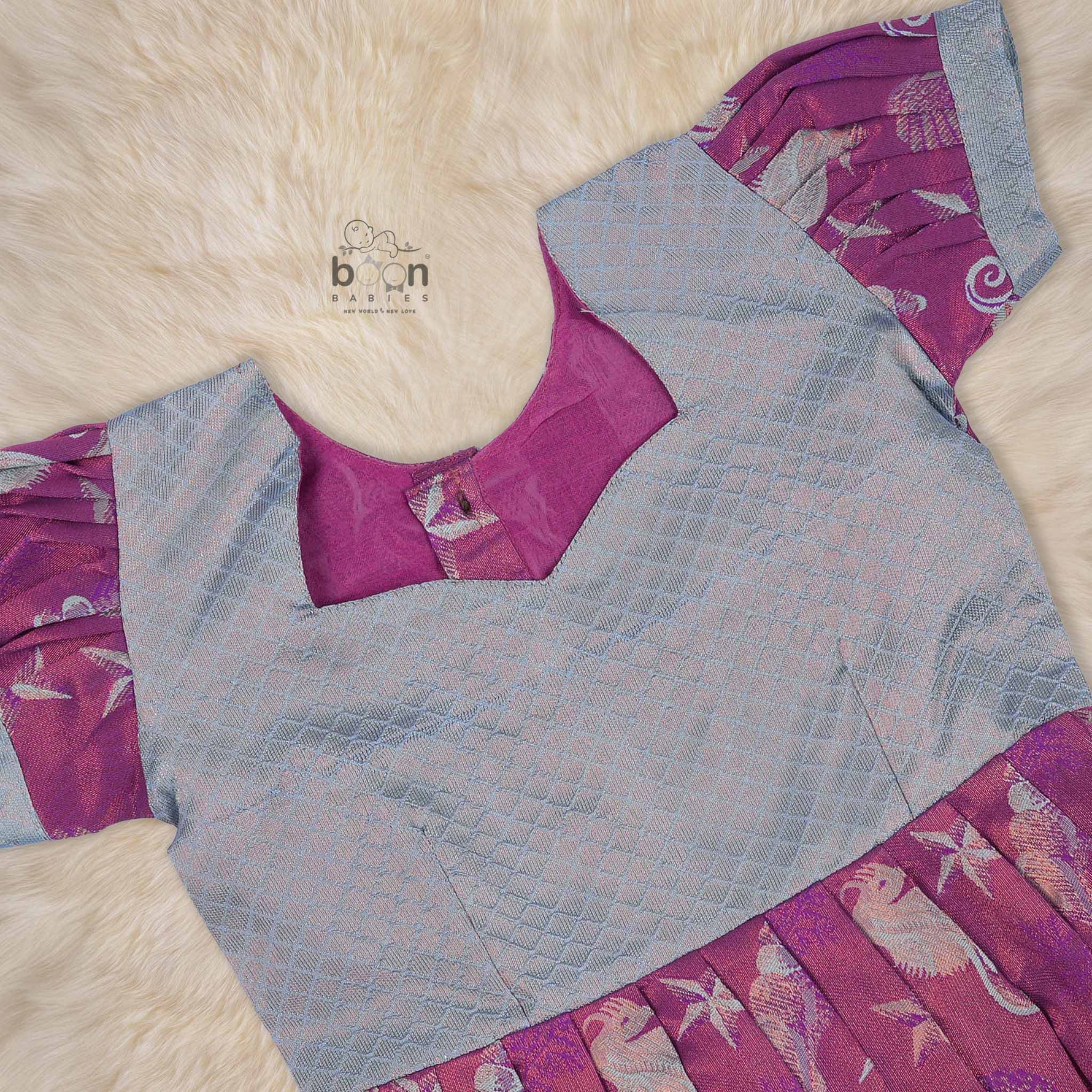 Elegant ethnic frock in purple and grey silk with seahorse-themed zari work, designed for girls aged 1 to 5 years. Traditional style, festive comfort.