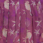 Elegant ethnic frock in purple and grey silk with seahorse-themed zari work, designed for girls aged 1 to 5 years. Traditional style, festive comfort.