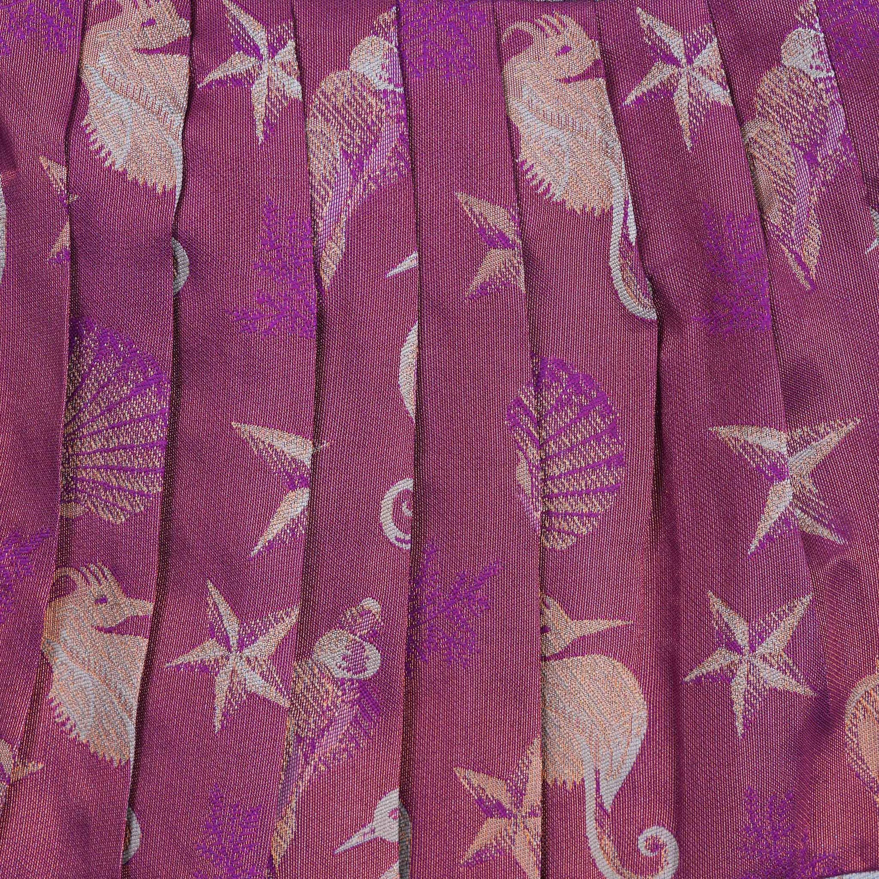 Elegant ethnic frock in purple and grey silk with seahorse-themed zari work, designed for girls aged 1 to 5 years. Traditional style, festive comfort.