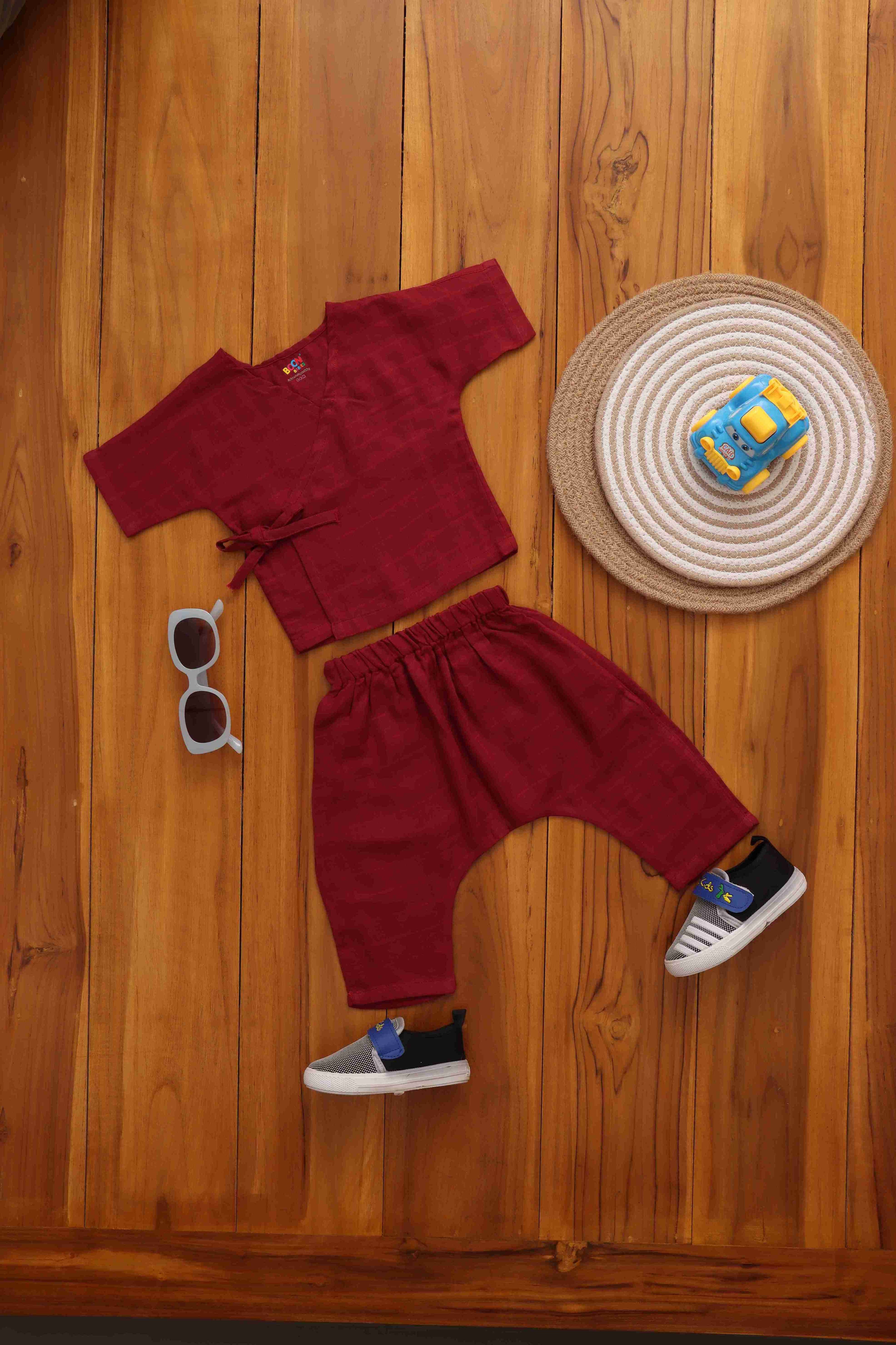 Maroon baby kimono top with matching pants from boonbabies, made of soft 2-layer muslin for everyday comfort.