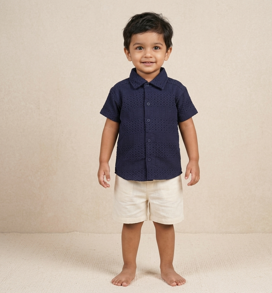 Lightweight solid popcorn shirt for boys by Boon Babies, featuring a regular collar and casual polycotton fabric for kids ages 6 months to 5 years.