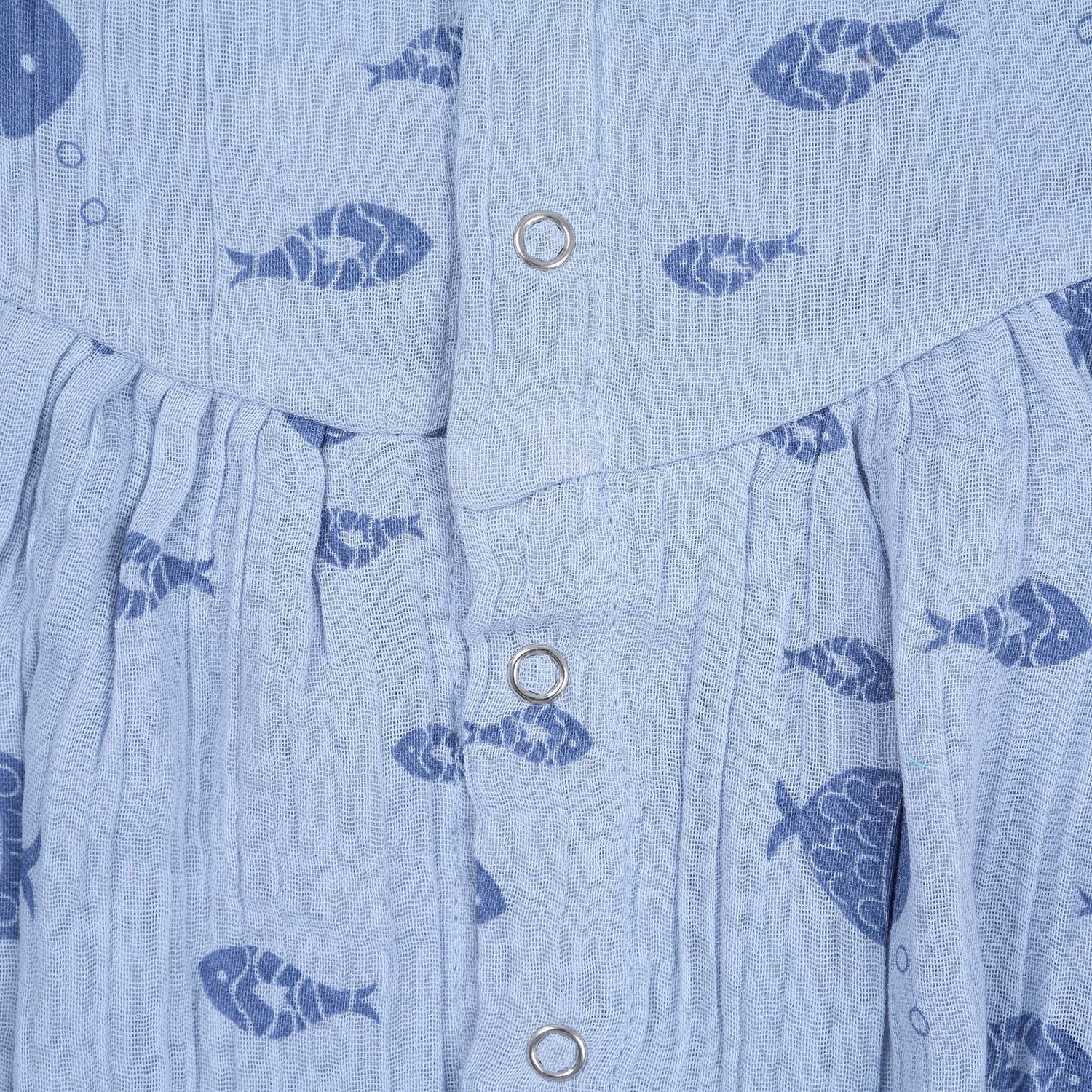 Baby romper in soft blue crinkled muslin with navy fish prints and snap buttons – perfect for 0 to 12 months, from Boon Babies, Coimbatore.