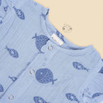 Baby romper in soft blue crinkled muslin with navy fish prints and snap buttons – perfect for 0 to 12 months, from Boon Babies, Coimbatore.